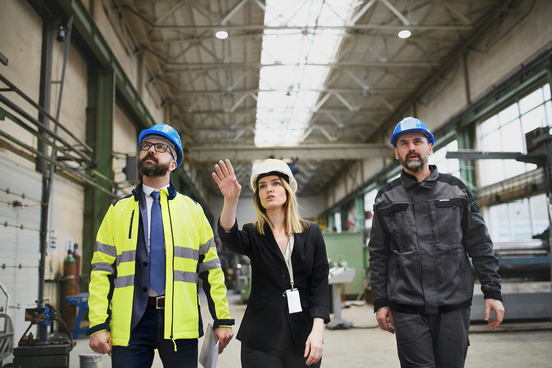 Management walking a production site
